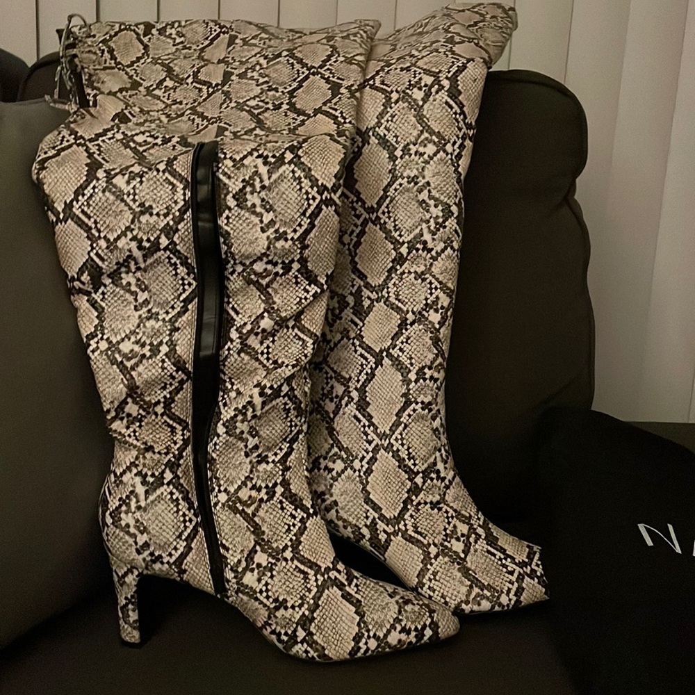 Size 10 women’s boots over the knee, wide leg